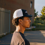 Cassowary Drive 2 Tone Logo Cap — side profile on model